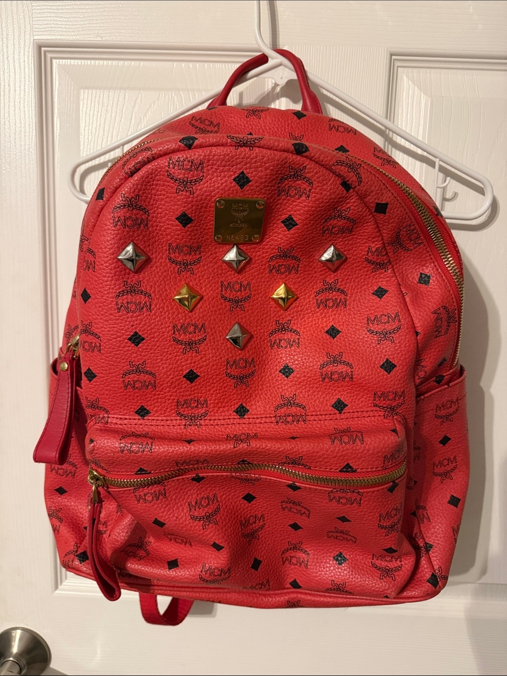 MCM Red Logo Studded Leather Mini Backpack